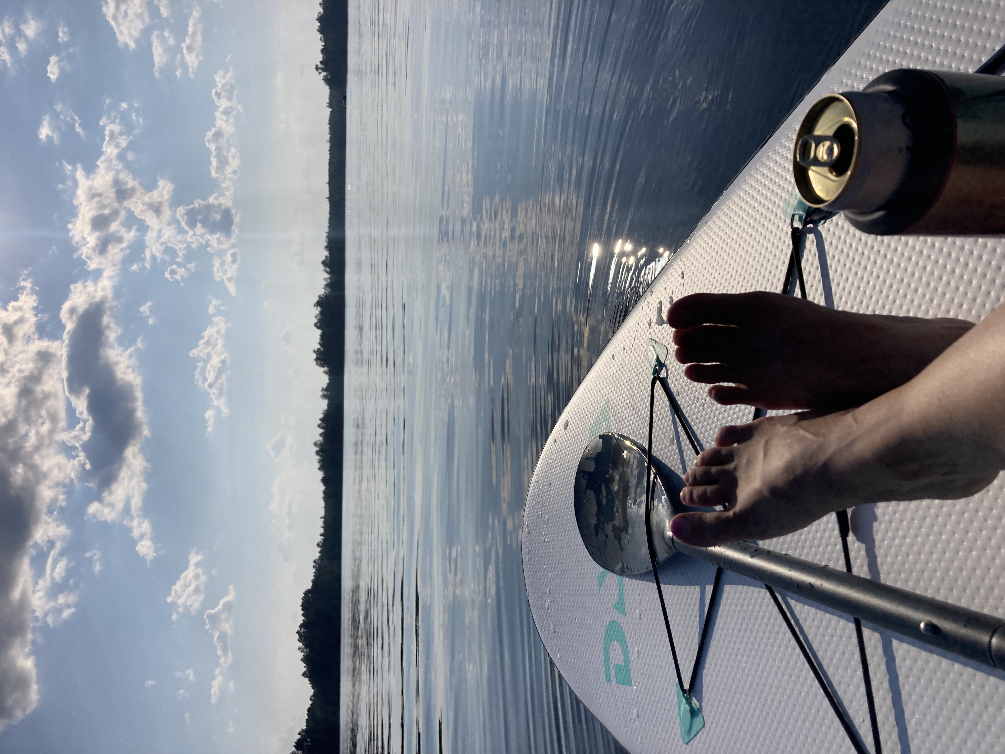 Sara on a paddleboard on the lake